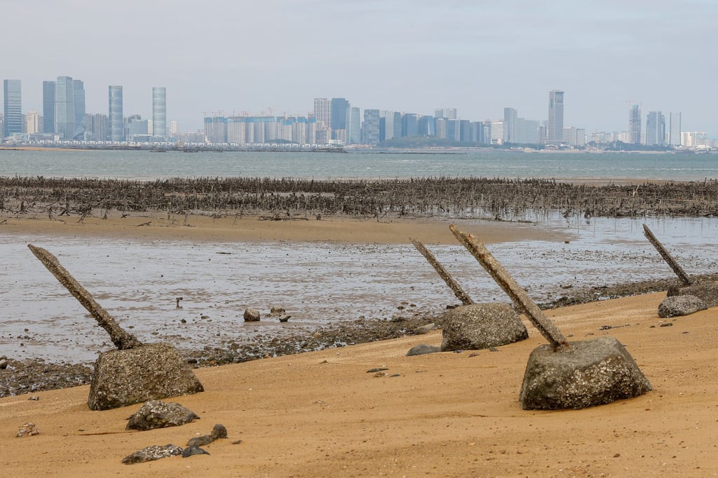 Anti-landing barricades on the beach with China’s Xiamen in the background in Quemoy, Taiwan. Photo: Reuters Anti-landing barricades on the beach with China’s Xiamen in the background in Quemoy, Taiwan. Photo: Reuters