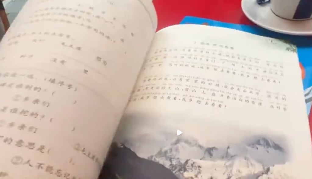 The student’s school exercise books were discovered by a waiter in the toilets of the Paris cafe. Photo: Weibo The student’s school exercise books were discovered by a waiter in the toilets of the Paris cafe. Photo: Weibo