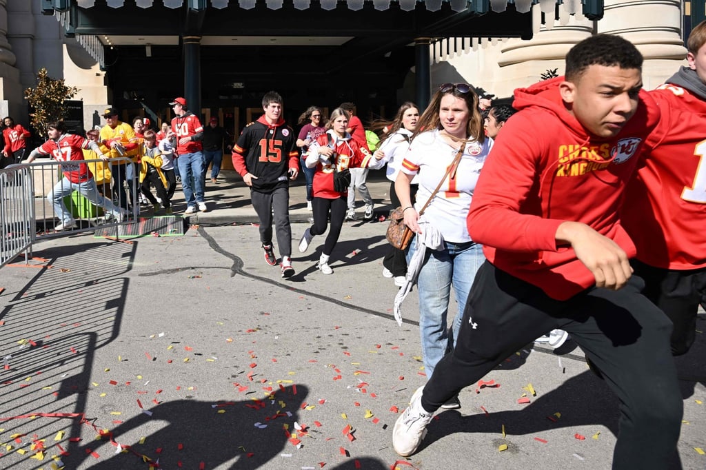 People flee after shots were fired near the Kansas City Chiefs’ Super Bowl victory parade on February 14 in Kansas City, Missouri. Photo: AFP People flee after shots were fired near the Kansas City Chiefs’ Super Bowl victory parade on February 14 in Kansas City, Missouri. Photo: AFP