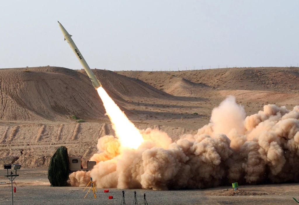 A test firing of a surface-to-surface Fateh 110 missile. File photo: Iranian Defence Ministry via AFP