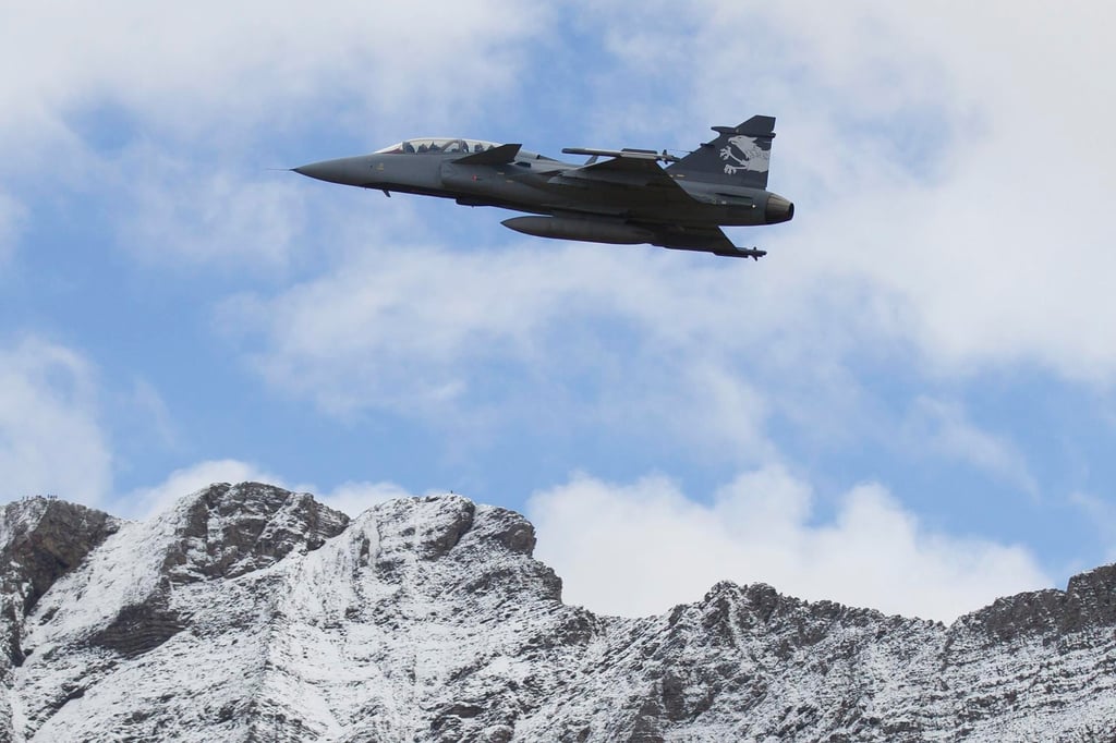 A Gripen F Demonstrator jet performs during a flight show in Axalp near Meiringen, Switzerland, in October 2012. Photo: AP