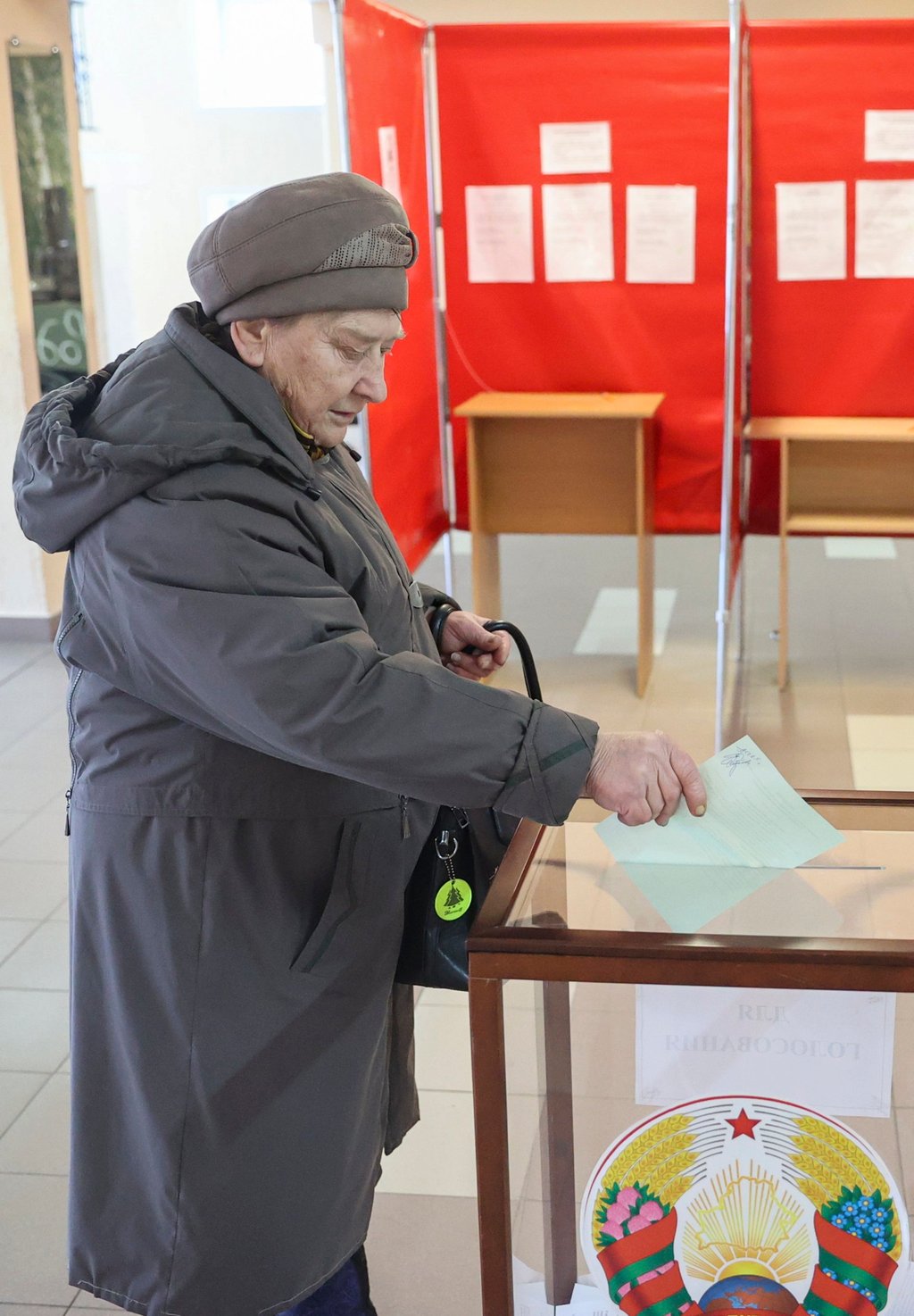 A woman casts her ballot during parliamentary elections at a polling station in Cherven, Belarus on Sunday. Photo: EPA-EFE