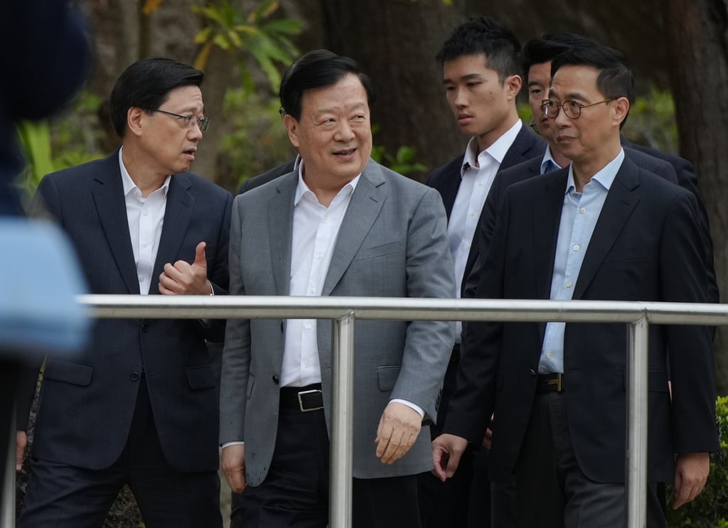 Hong Kong and Macau Affairs Office director Xia Baolong (centre) is visiting the city on a fact-finding mission. Photo: Eugene Lee Hong Kong and Macau Affairs Office director Xia Baolong (centre) is visiting the city on a fact-finding mission. Photo: Eugene Lee