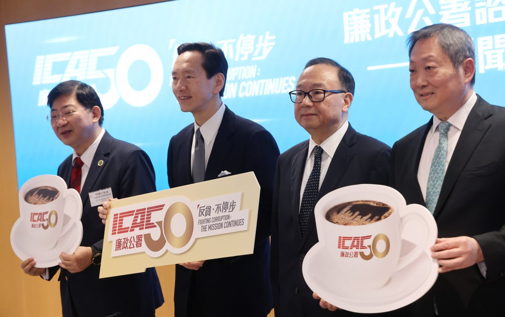 (From left) Simon Ho, the chairman of the Citizens Advisory Committee on Community Relations, Bernard Chan, Martin Liao and Kelvin Wong of the Independent Commission Against Corruption, highlight the city’s anti-graft results last year. Photo: Dickson Lee