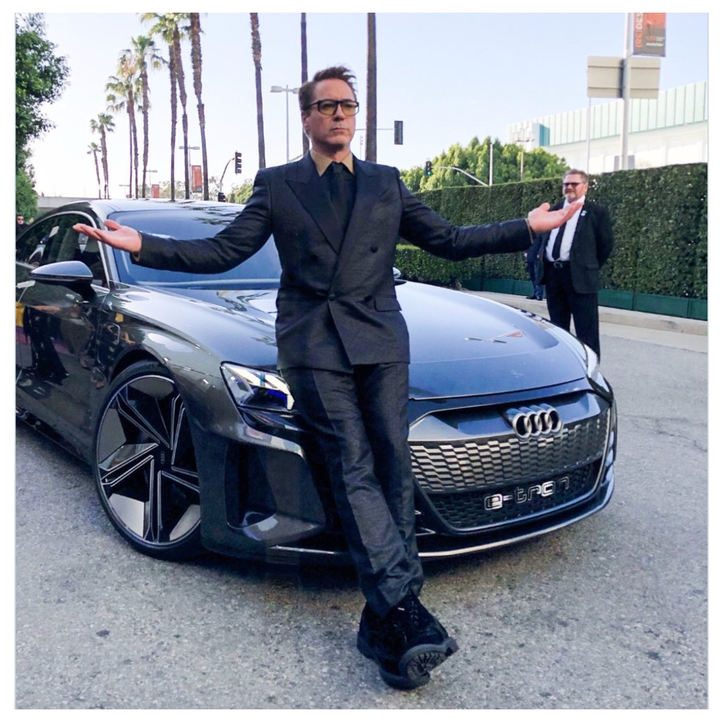 Robert Downey Jr posting with his Audi E-tron GT. Photo @Avengers/X