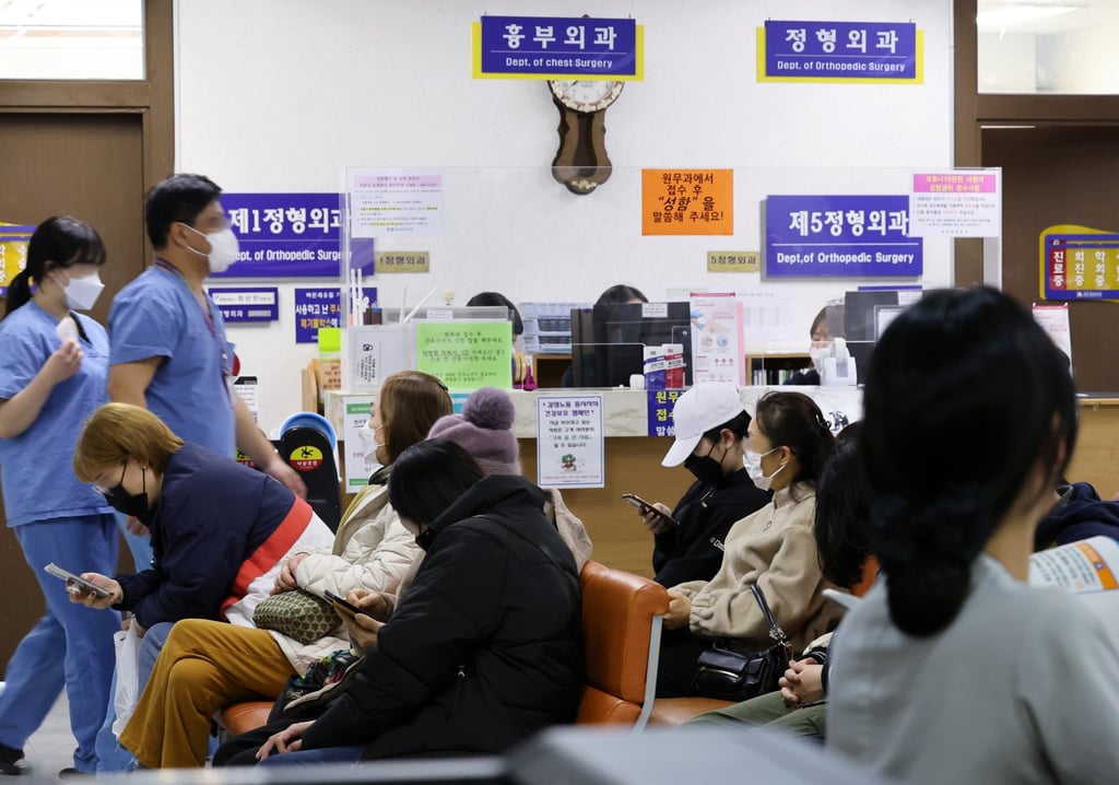 Patients wait for treatment at a hospital in Gwangju. Most of the country’s 13,000 trainee doctors resigned or walked off the job over the past week, forcing hospitals to shelve surgeries or turn away some emergency patients. Photo: EPA-EFE Patients wait for treatment at a hospital in Gwangju. Most of the country’s 13,000 trainee doctors resigned or walked off the job over the past week, forcing hospitals to shelve surgeries or turn away some emergency patients. Photo: EPA-EFE