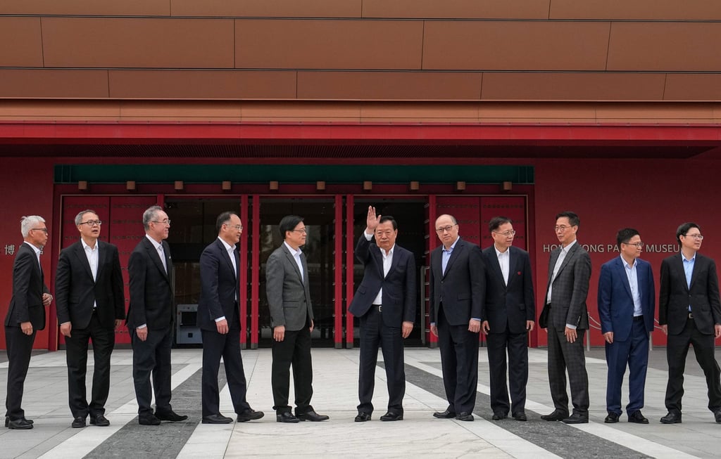 Xia Baolong waves on his visit to the arts hub with other dignitaries. Photo: Elson Li