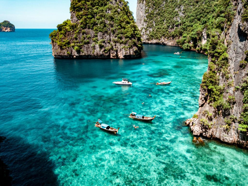 Long-tail boats take resort guests out on excursions. Photo: SAii Phi Phi Island Village Resort