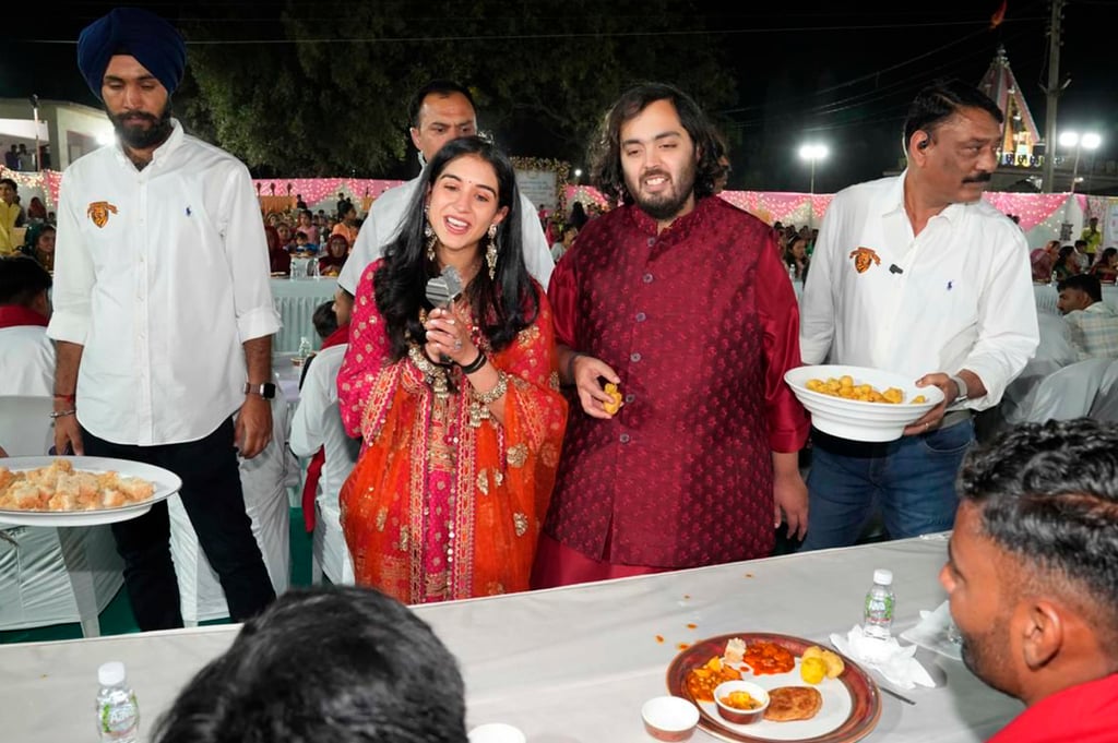 Anant Ambani and bride Radhika Merchant interact with guests during a community food service held as part of their pre-wedding celebrations. Photo: AP/Handout Anant Ambani and bride Radhika Merchant interact with guests during a community food service held as part of their pre-wedding celebrations. Photo: AP/Handout