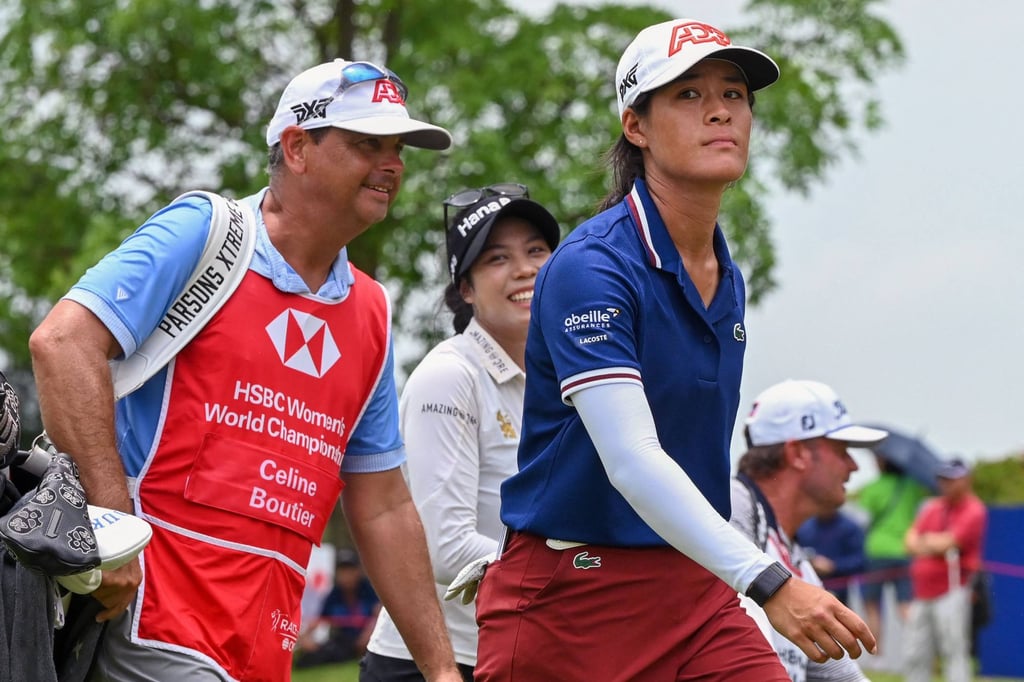 Celine Boutier (right) walks off the 18th green after finishing her second round in Singapore. Photo: AFP Celine Boutier (right) walks off the 18th green after finishing her second round in Singapore. Photo: AFP