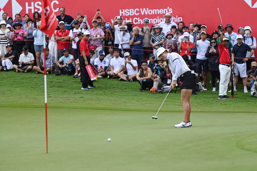 Hannah Green sends her winning putt towards the hole at Sentosa Golf Club. Photo: AFP Hannah Green sends her winning putt towards the hole at Sentosa Golf Club. Photo: AFP