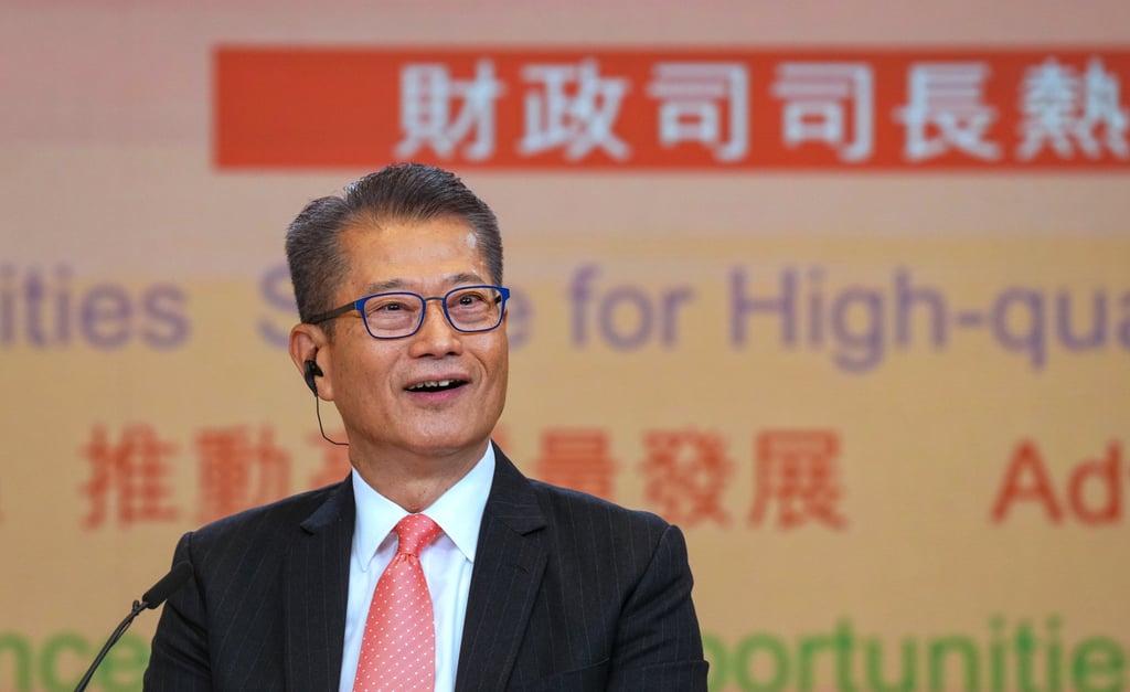 Finance chief Paul Chan says Hong Kong officials will visit mainland Chinese cities to court medium-sized firms. Photo: Elson Li Finance chief Paul Chan says Hong Kong officials will visit mainland Chinese cities to court medium-sized firms. Photo: Elson Li