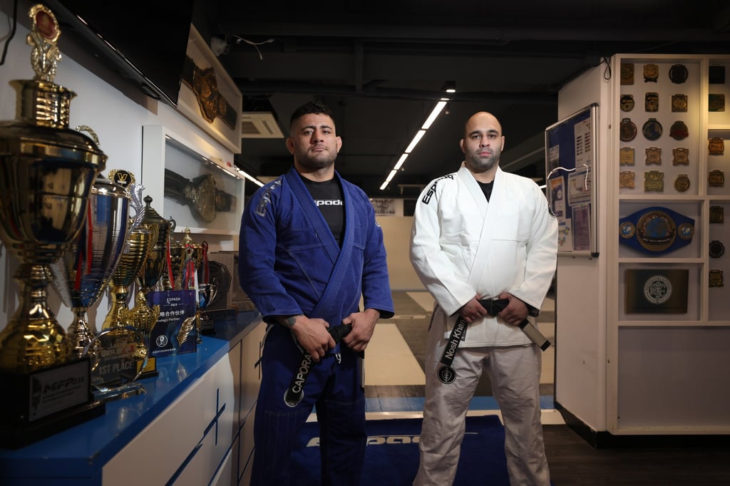 Rodrigo Caporal (in blue) and Nosherwan Khanzada at their BJJ gym. Photo: Xiaomei Chen