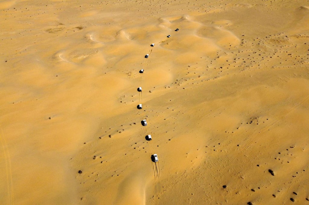 Iraqi campers drive through the Samawah desert south of Baghdad. Photo: AFP Iraqi campers drive through the Samawah desert south of Baghdad. Photo: AFP