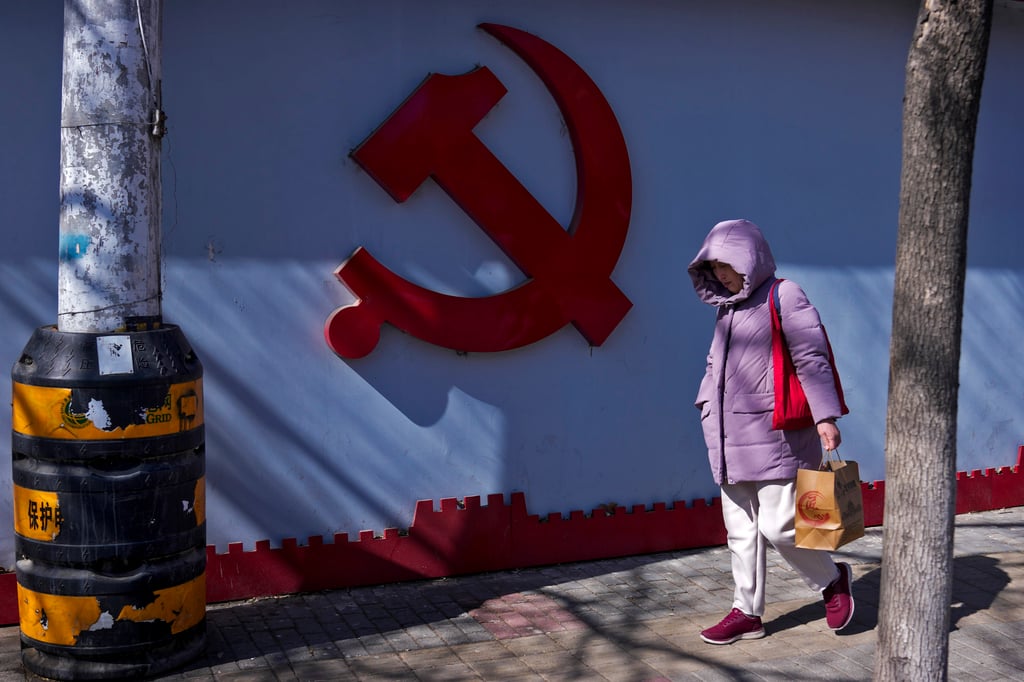 A Communist Party logo seen near a residential area in Beijing. Photo: AP Photo A Communist Party logo seen near a residential area in Beijing. Photo: AP Photo