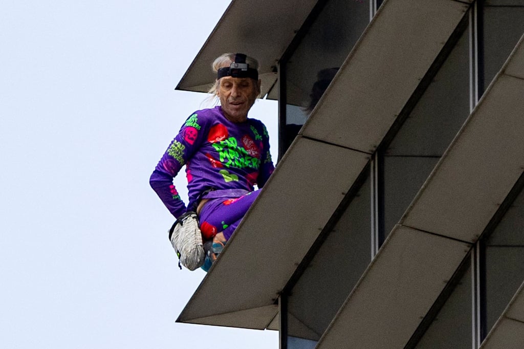 Urban climber Alain Robert scaled a Manila skyscraper to support the Philippines’ maritime claims in the disputed South China Sea. Photo: Reuters Urban climber Alain Robert scaled a Manila skyscraper to support the Philippines’ maritime claims in the disputed South China Sea. Photo: Reuters