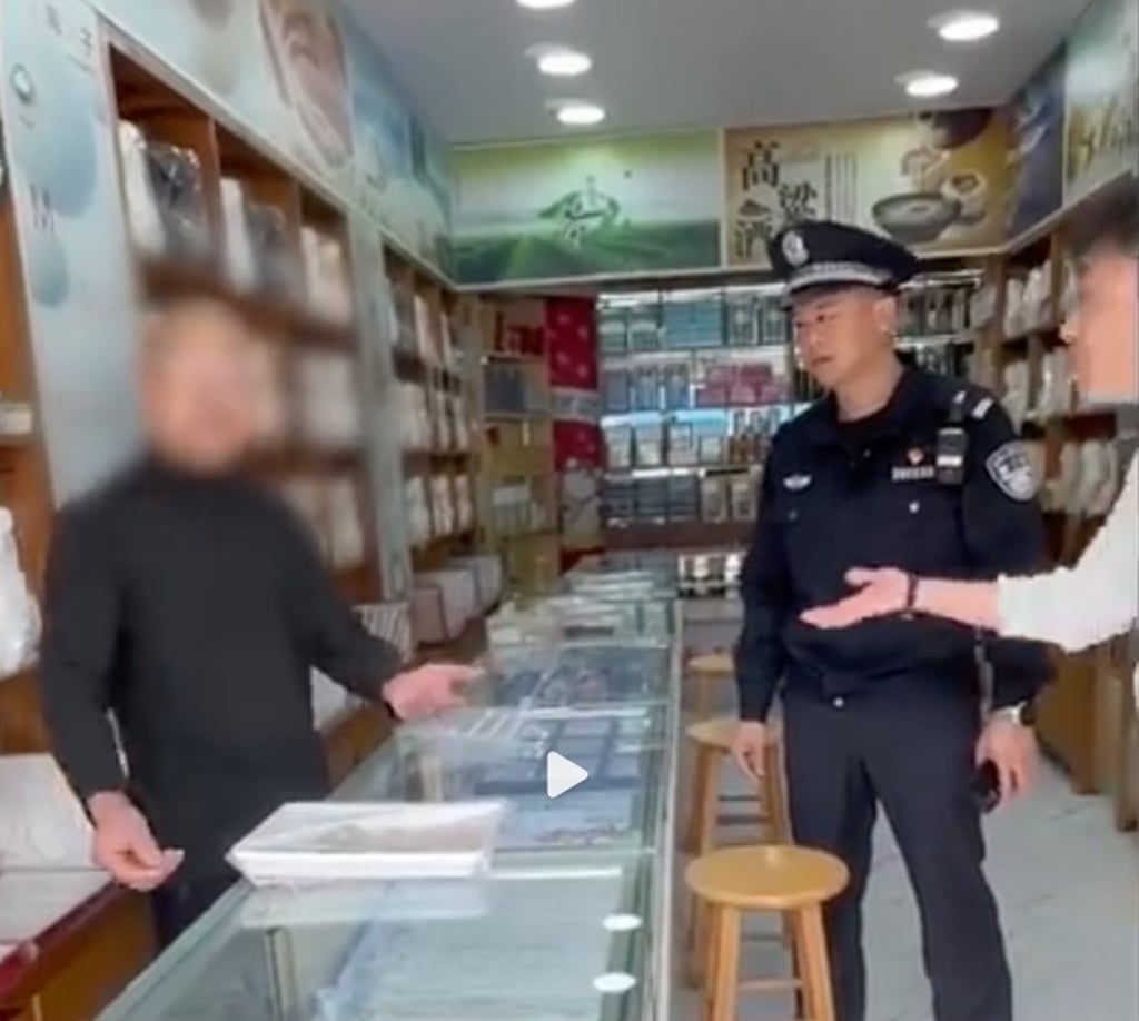 The shop owner insulted the woman, who was with her partner, far right, and a fierce argument erupted ending in the police being called. Photo: Douyin