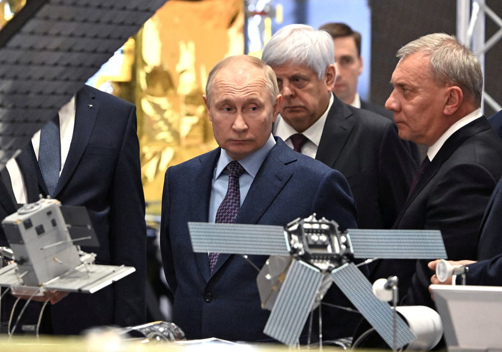 Russia’s President Vladimir Putin (centre), accompanied by Roscosmos head Yuri Borisov (right), visits the centre of the Rocket and Space Corporation “Energia” in Korolyov outside Moscow in October 2023. Photo: Sputnik via Reuters