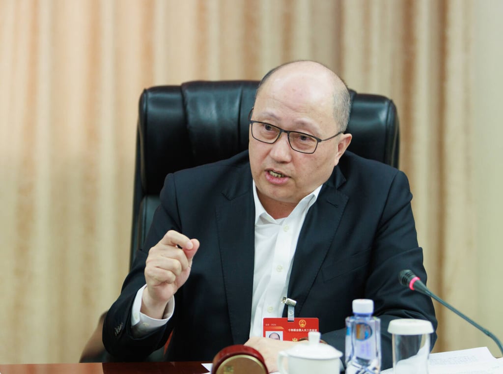Zheng Yanxiong, director of the central government’s liaison office in Hong Kong, meets city delegates to the NPC on Tuesday. He emphasised that finance was the lifeblood of the country’s economy. Photo: Handout Zheng Yanxiong, director of the central government’s liaison office in Hong Kong, meets city delegates to the NPC on Tuesday. He emphasised that finance was the lifeblood of the country’s economy. Photo: Handout