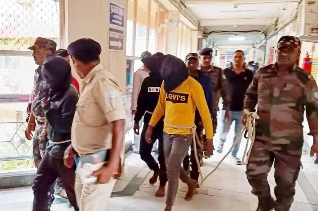 Police escort men accused of allegedly carrying out a brutal assault on a Spanish woman, to a district court in Dumka, in India’s Jharkhand state on March 4. Photo: AFP Police escort men accused of allegedly carrying out a brutal assault on a Spanish woman, to a district court in Dumka, in India’s Jharkhand state on March 4. Photo: AFP