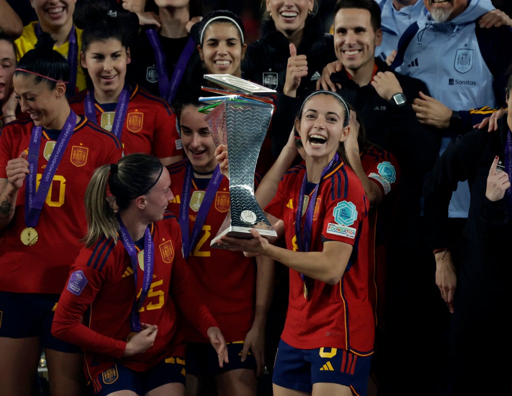 Spain’s Aitana Bonmati and teammates lift the Women’s Nations League trophy. Photo: Reuters