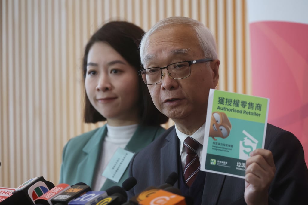 Secretary for Environment and Ecology Tse Chin-wan (right) meets the media after a briefing on the municipal solid waste charging scheme, at government headquarters in Tamar on January 26. Photo: Edmond So