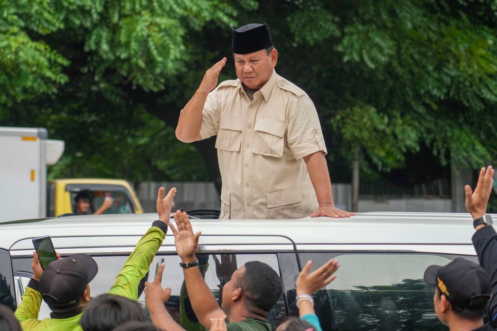 Indonesian defence minister and presumptive president-elect Prabowo Subianto greets supporters in Jakarta on February 15. Photo: AP