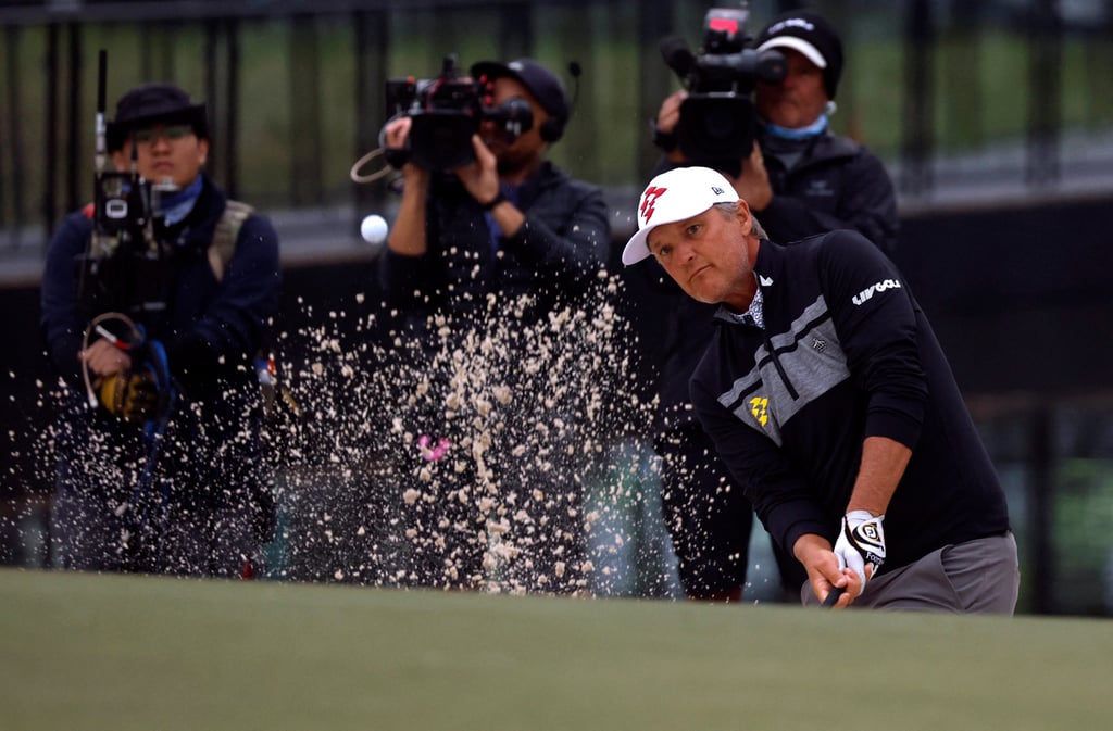 Matt Jones chips out of a bunker at Hong Kong Golf Club. Photo: Reuters