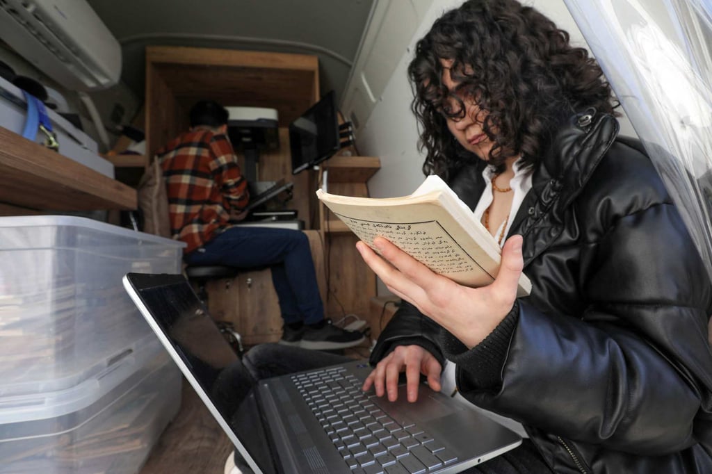 The Kurdistan Centre for Arts and Culture is seeking to digitise historic Kurdish volumes and manuscripts to preserve their culture. Photo: AFP The Kurdistan Centre for Arts and Culture is seeking to digitise historic Kurdish volumes and manuscripts to preserve their culture. Photo: AFP