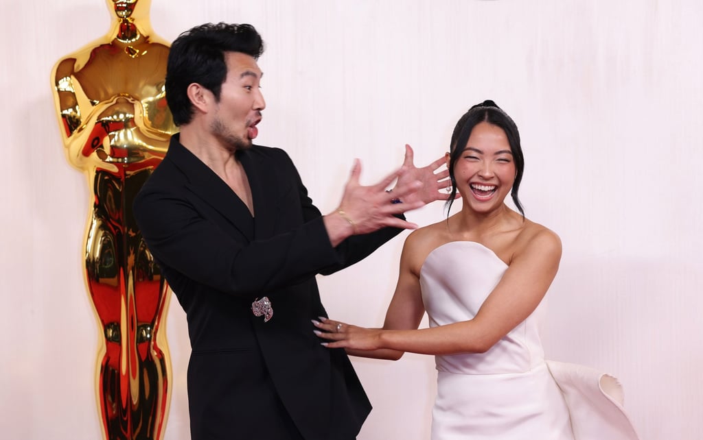 Chinese-Canadian actor Simu Liu and his girlfriend Allison Hsu on the red carpet at the Oscars in Los Angeles on Sunday. Photo: Los Angeles Times / TNS