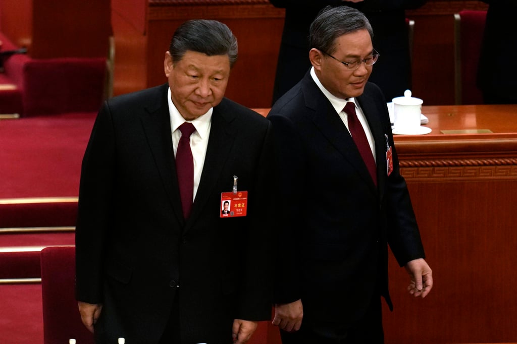 President Xi Jinping (left) and Premier Li Qiang arrive for the opening session of the National People’s Congress in Beijing last week. Photo: AP President Xi Jinping (left) and Premier Li Qiang arrive for the opening session of the National People’s Congress in Beijing last week. Photo: AP