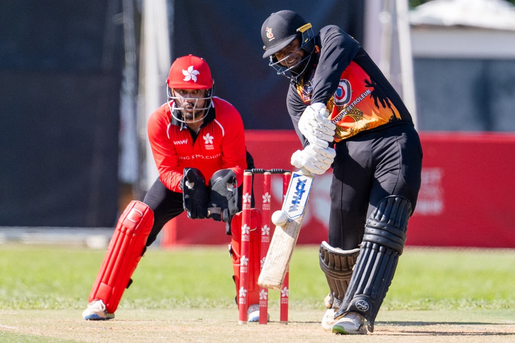 PNG opener Tony Ura watched by Hong Kong wicketkeeper Zeeshan Ali. Photo: Panda Man Chung Yan. PNG opener Tony Ura watched by Hong Kong wicketkeeper Zeeshan Ali. Photo: Panda Man Chung Yan.