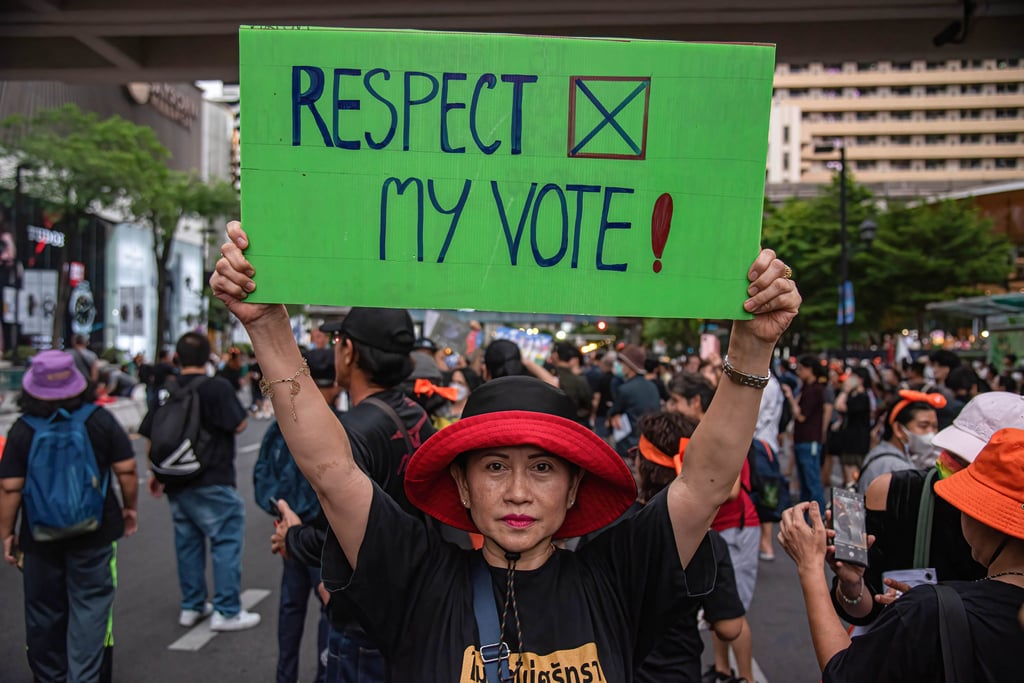 A protester holds up a placard during a Pro-democracy demonstration calling the senators to respect the result of the May 14 general election. Photo: dpa A protester holds up a placard during a Pro-democracy demonstration calling the senators to respect the result of the May 14 general election. Photo: dpa