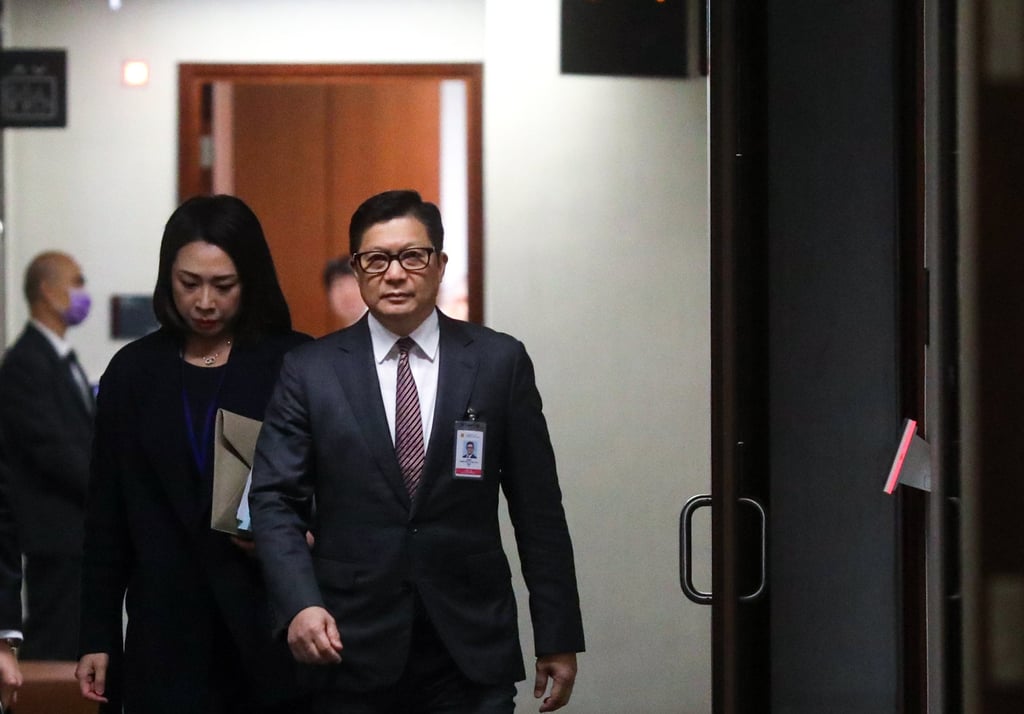 Secretary for Security Chris Tang leaves an earlier bills committee. He says authorities are emphasising fairness and reasonableness in enacting the legislation. Photo: Sun Yeung