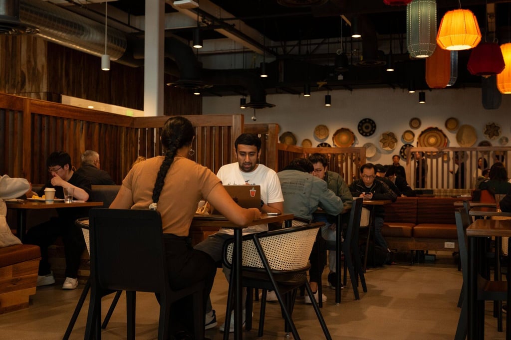 Employees eat lunch at a cafeteria at the Google Bay View campus in California. Photo: Bloomberg