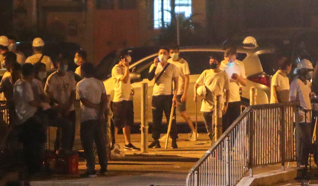 A mob of men in white T-shirts on the streets near Yuen Long MTR station after violence erupted during the 2019 social unrest. Photo: Winson Wong