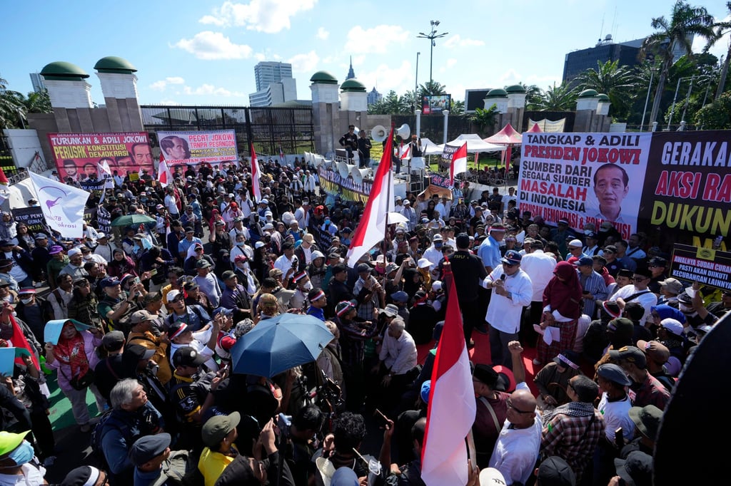 Protesters in Jakarta on Tuesday demand the impeachment of Indonesian President Joko Widodo on allegations of meddling in the February 14 election. Photo: AP Protesters in Jakarta on Tuesday demand the impeachment of Indonesian President Joko Widodo on allegations of meddling in the February 14 election. Photo: AP