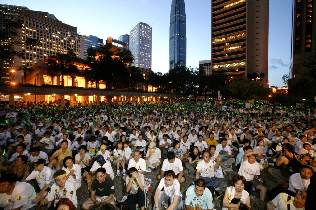 The Legislative Council building is surrounded by around 50,000 demonstrators during a candlelight vigil against a domestic national security bill in July, 2003. Photo: SCMP The Legislative Council building is surrounded by around 50,000 demonstrators during a candlelight vigil against a domestic national security bill in July, 2003. Photo: SCMP