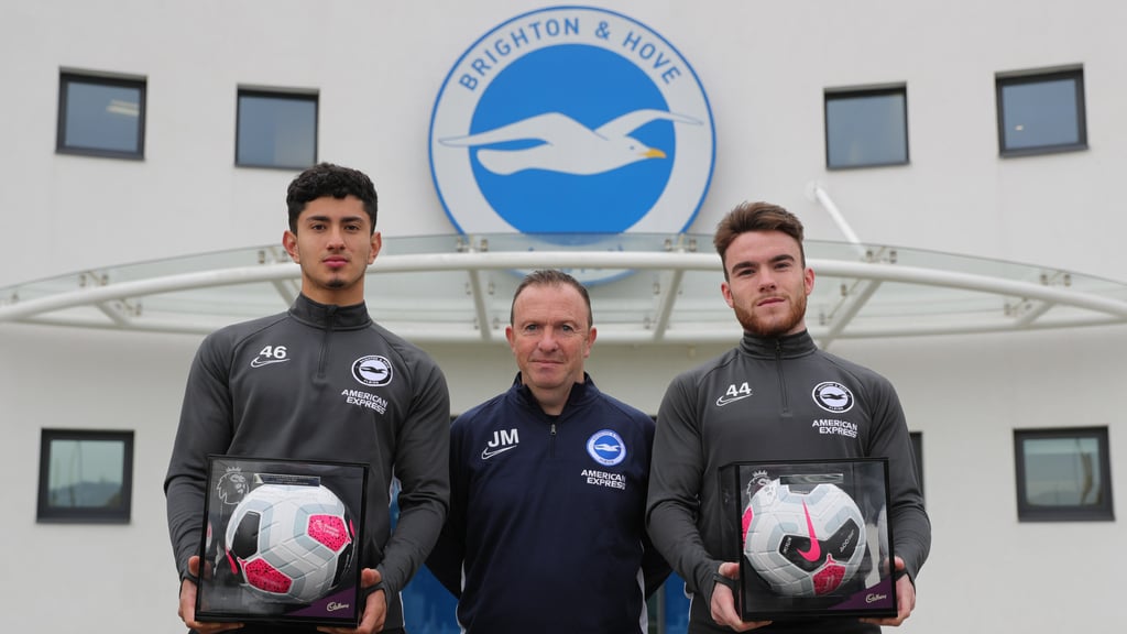 John Morling with academy stars Steven Alzate (left) and Aaron Connolly, who made their debuts for the Premier League club in 2019. Photo: Brighton and Hove Albion John Morling with academy stars Steven Alzate (left) and Aaron Connolly, who made their debuts for the Premier League club in 2019. Photo: Brighton and Hove Albion
