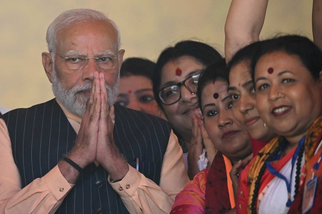 Indian Prime Minister Narendra Modi gestures to supporters at Bharatiya Janata Party public meeting in Barasat, on the outskirts of Kolkata, on March 6. Photo: AFP Indian Prime Minister Narendra Modi gestures to supporters at Bharatiya Janata Party public meeting in Barasat, on the outskirts of Kolkata, on March 6. Photo: AFP