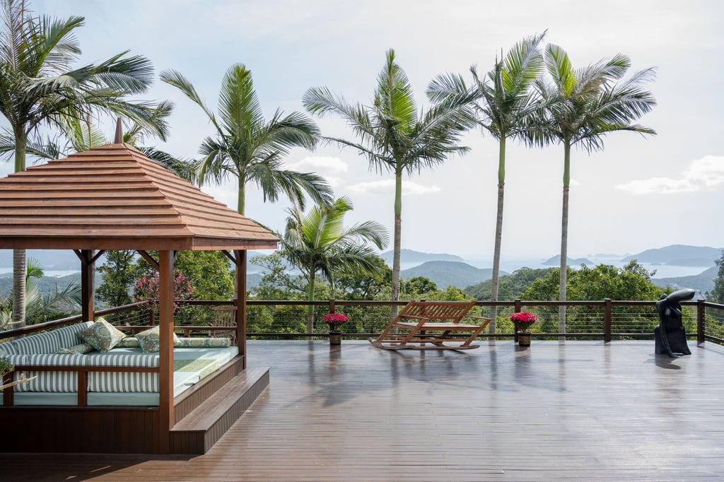 The hilltop Sai Kung home has a deck that offers stunning views. Photo: Eugene Chan. Styling: Flavia Markovits The hilltop Sai Kung home has a deck that offers stunning views. Photo: Eugene Chan. Styling: Flavia Markovits