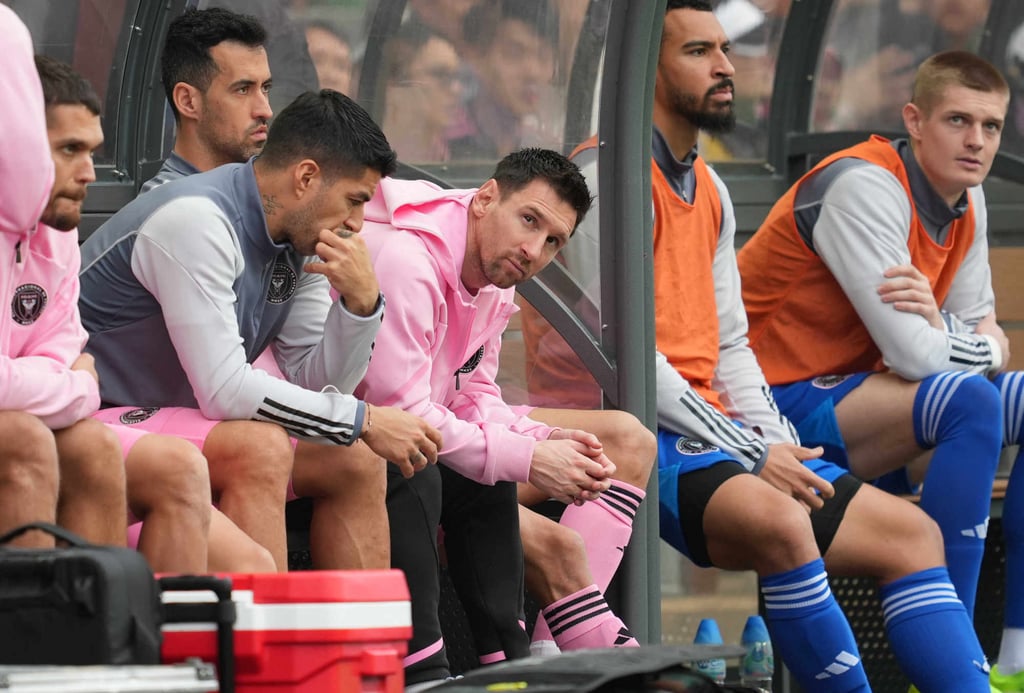 Lionel Messi is seen on the bench during the friendly match at Hong Kong Stadium in February. Photo: Sam Tsang