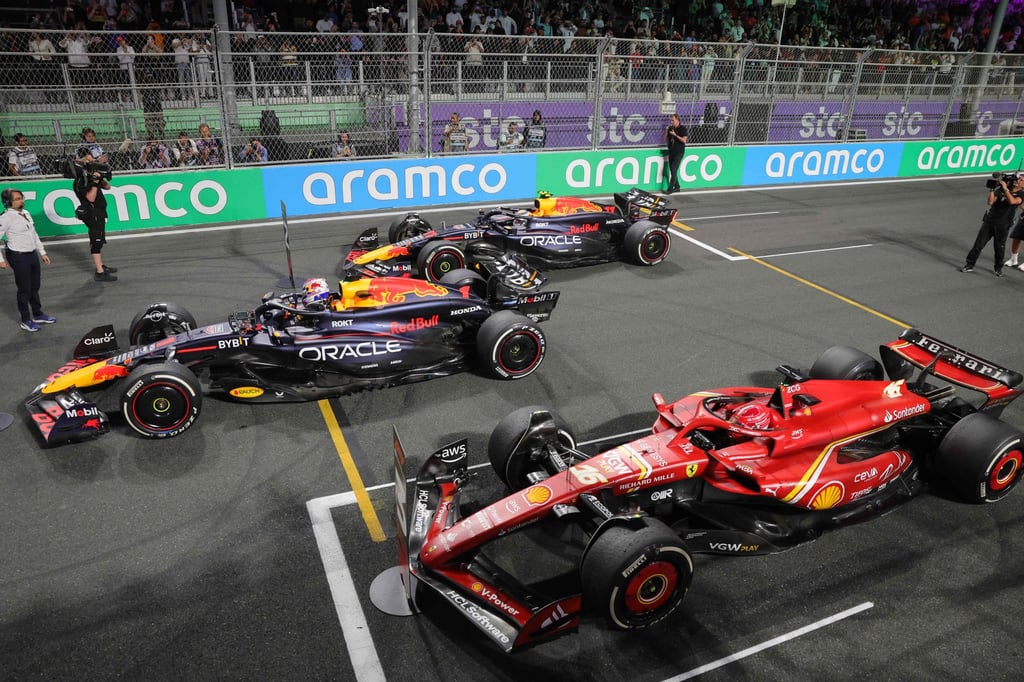 Max Verstappen (centre), Red Bull teammate Sergio Perez and Ferrari’s Charles Leclerc after the end of the Saudi Arabian Grand Prix in Jeddah. Photo: AFP