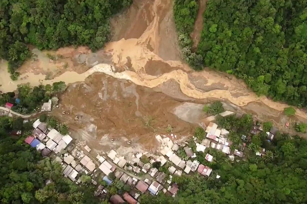 A still taken from aerial footage shows the site of a landslide in Mindanao, the Philippines, last month after flooding exacerbated by deforestation following unseasonably heavy rains. Photo: AFP