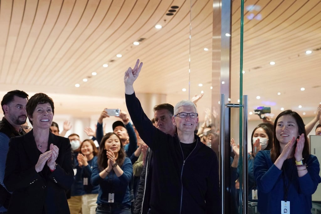 Apple CEO Tim Cook attends the opening of a new flagship Apple store in Shanghai, China on Thursday. Photo: Liu Ying / Xinhua via AP Apple CEO Tim Cook attends the opening of a new flagship Apple store in Shanghai, China on Thursday. Photo: Liu Ying / Xinhua via AP