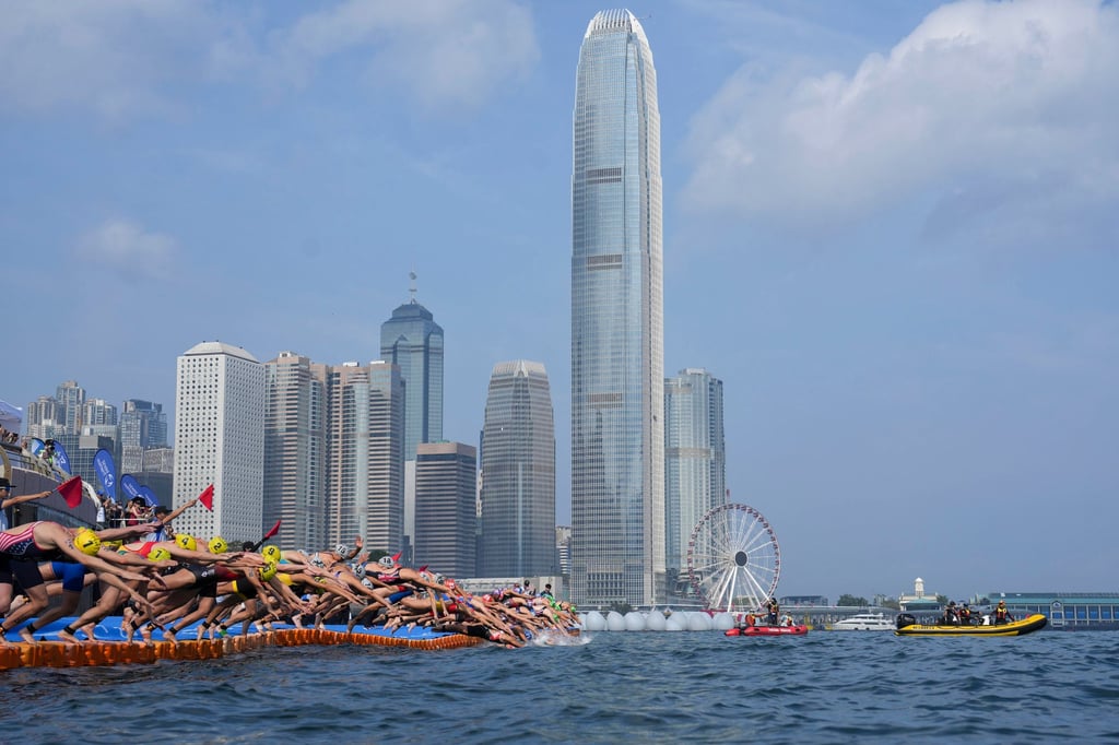 The elite women dive into the water at the start of their race at the World Triathlon Cup event in Hong Kong. Photo: Elson Li