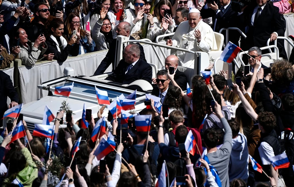 Pope Francis waves during the Palm Sunday Mass in Saint Peter’s Square, Vatican City, Rome. Photo: EPA-EFE