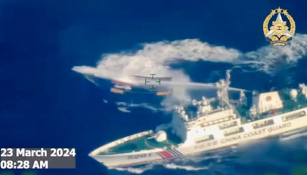 A still from footage provided by the Armed Forces of the Philippines shows a Chinese coastguard ship using a water cannon on a Philippine resupply vessel on Saturday. Photo: Armed Forces of the Philippines via AP A still from footage provided by the Armed Forces of the Philippines shows a Chinese coastguard ship using a water cannon on a Philippine resupply vessel on Saturday. Photo: Armed Forces of the Philippines via AP