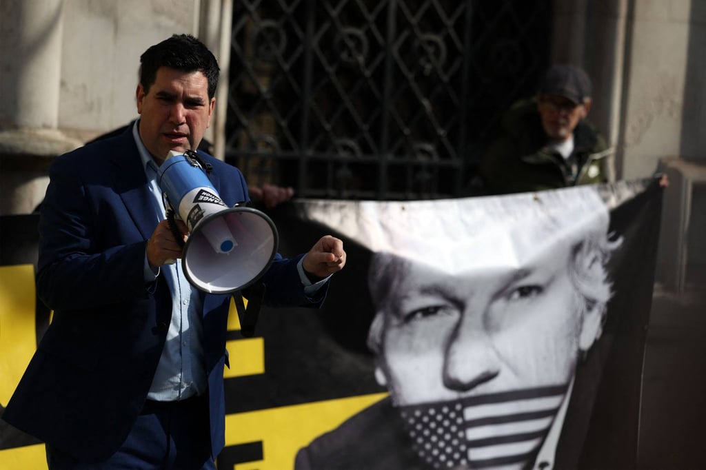 A supporter of WikiLeaks founder Julian Assange speaks outside The Royal Courts of Justice, Britain’s High Court. Assange was not in court for the latest ruling. Photo: AFP A supporter of WikiLeaks founder Julian Assange speaks outside The Royal Courts of Justice, Britain’s High Court. Assange was not in court for the latest ruling. Photo: AFP
