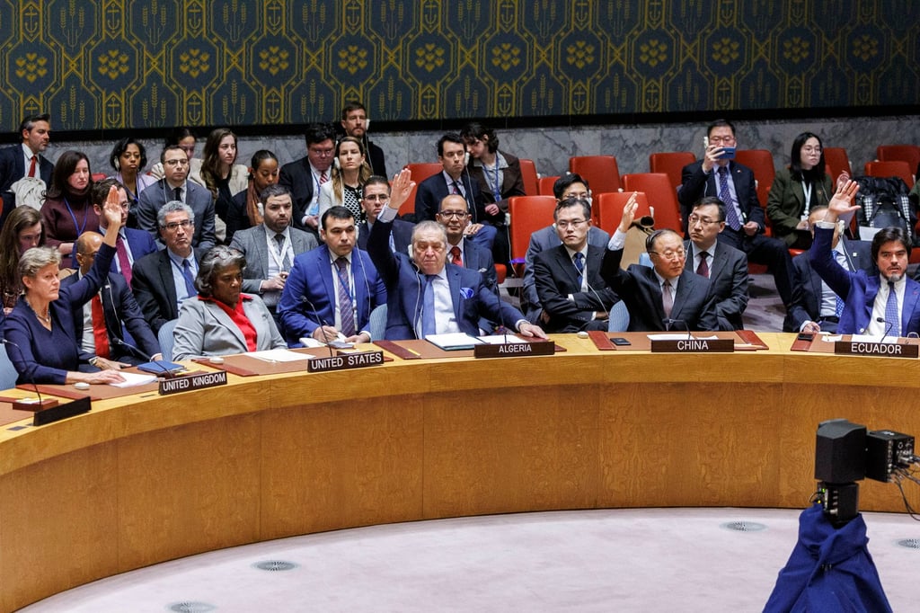 Ambassadors, except for US ambassador Linda Thomas-Greenfield, second left, raise their hands to vote in favour of a resolution calling for a ceasefire in Gaza, during a UN Security Council meeting in New York on Monday. Photo: EPA-EFE